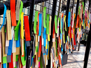 many multi-colored ribbons on the wall