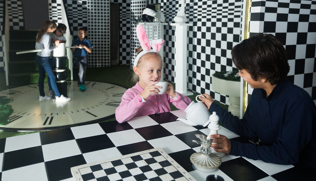 young players play in chess  quest room