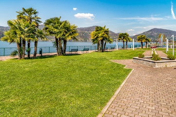 Obraz premium Lakefront of Ranco, is small village located on the shore of Lake Maggiore in province of Varese, Italy