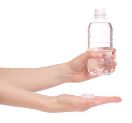 A bottle of water in hand