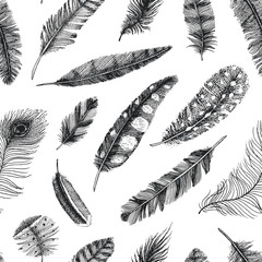 Seamless pattern. Rustic realistic feathers of different birds, owls, peacocks, ducks. engraved hand drawn in old vintage sketch. Vector illustration.