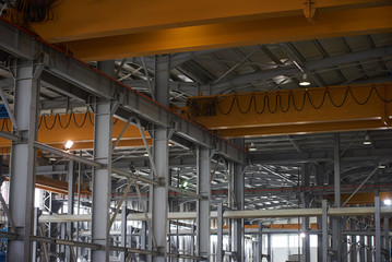 Fototapeta premium Large Warehouse interior inside a Factory building. Industry manufacturing concept