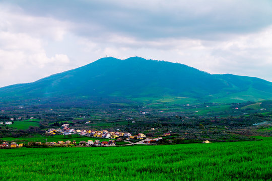 mountain on a blue sky background, a dormant volcano in the town of Melfi, in Italy, Mountain range, panoramic landscape