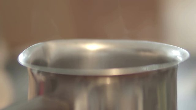 Cooking Pot and cook steams  cinematic dof