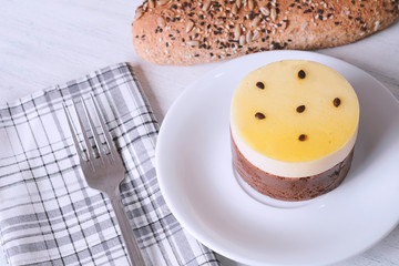 Fresh passion fruit on white wooden background