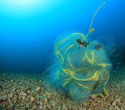 Ghost fishing net pollution of ocean  