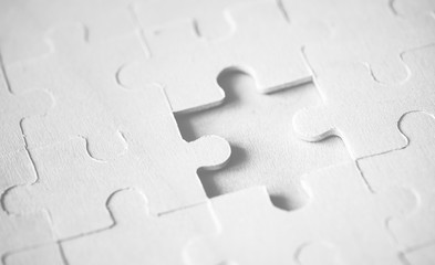Macro shot jigsaw puzzle missing solution concept