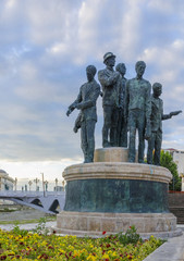 Fototapeta na wymiar Monument of the Boatmen of Salonica in Skopje - Macedonia at sunrise