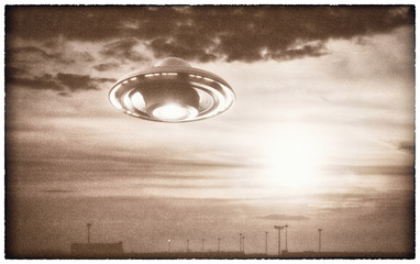 Old UFO picture. Image concept of aliens. Rendering 3D over the real picture. Clipping path of the photo frame included. © ktsdesign