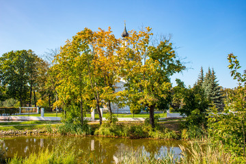 A view of the park pond and the church of Boris and Gleb of the 18th century in the Belkino estate
