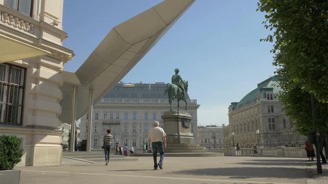 Walking by the Archduke Albrecht equestrian statue