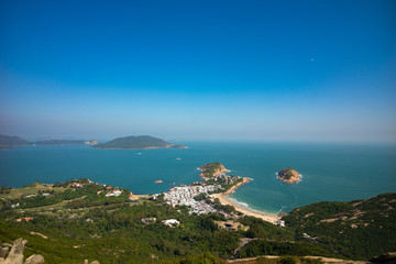 A view of Shark  beach from the top of a hill on Dragon's Back hiking trail, Hong Kong Asia