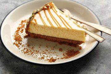 Yummy cheesecake piece on plate