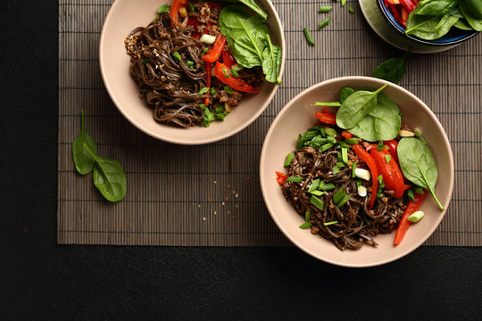 Asian soba noodles in two bowls