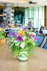 Fototapeta na wymiar flowers in vase on dinning table