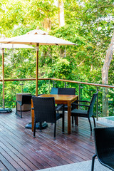 empty outdoor patio table and chair