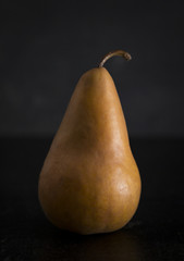 Still LIfe of Fresh Pears on a Dark Surface and Background