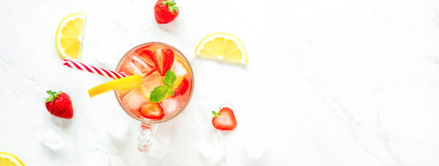 Colorful refreshing strawberry lemonade juice drinks for summer, panoramic banner background