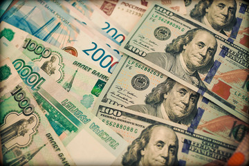 New banknote hundred dollars and russian rubles.