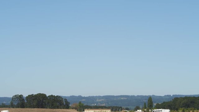 F-18 jet flies through in distance