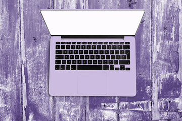 Flat lay computer on desk. Concept of a home office, new trend, ultra violet color, creative,...