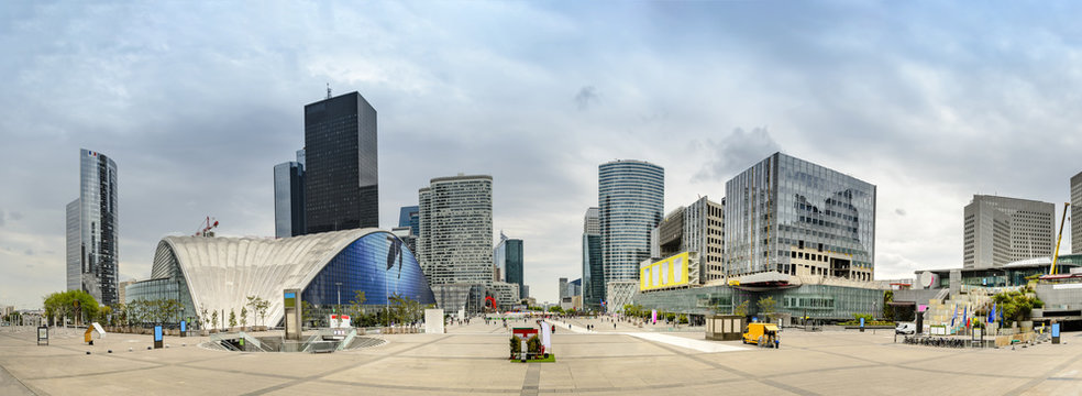 Panorama of La Defence , business and financial district with highrise skyscrapers buildings and convention center, no people and advertisments. View from Grande Arche