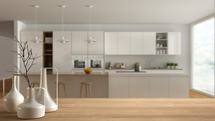 Wooden table top or shelf with minimalistic modern vases over blurred scandinavian modern kitchen,...