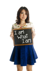 Asian female holding blackboard