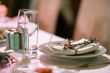 Empty plate with a napkin. Luxury wedding reception in restaurant. stylish decor and adorning. Restaurant table with food