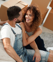 Happy newlyweds in a new apartment.