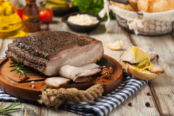 Baked whole pork bacon.