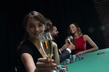 young beautiful woman playing in casino