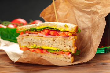 sandwich on a wooden table