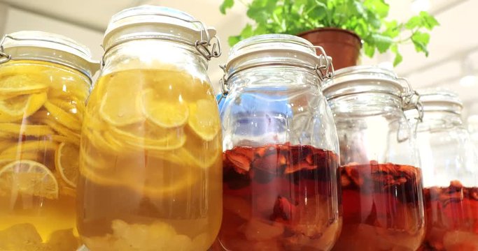 Canned compotes fruit syrup in preservation glass jars