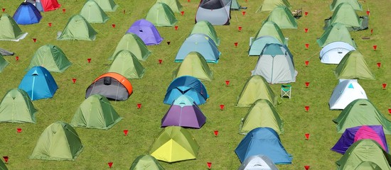 camp with many igloo tents at a campsite