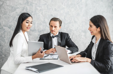 Asian business woman discussing/job interview with colleague/boss for business meeting and presentation