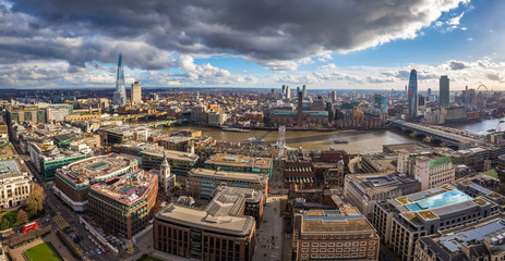 London, England - Panoramic skyline view of London with Millennium Bridge, famous skyscrapers and...