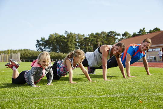 Family exercising together