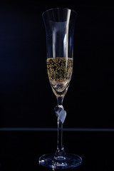 Glass with wedding rings