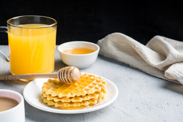 Healthy Breakfast coffee juice Cookies honey Banana on grey concrete background