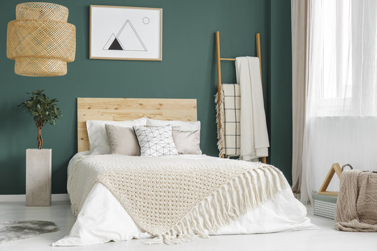 Green cozy bedroom interior