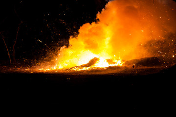 Fototapeta na wymiar Fire and smoke after the crackers got fire