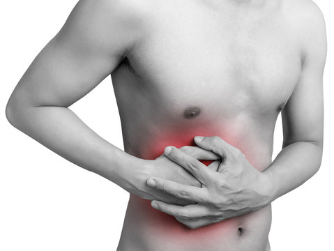 man stomach suffering from stomachache or Gastroenterologist. Concept with Healthcare And Medicine. Pain in red color. Isolate on white background