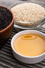 fresh sesame seeds on a rustic background