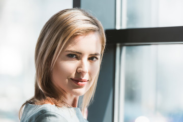 portrait of beautiful middle aged woman smiling at camera