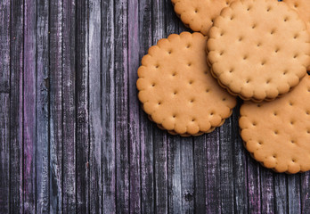 Cookies on wooden background. A place for a label. Place of text. Tea biscuits. Coffee biscuits.