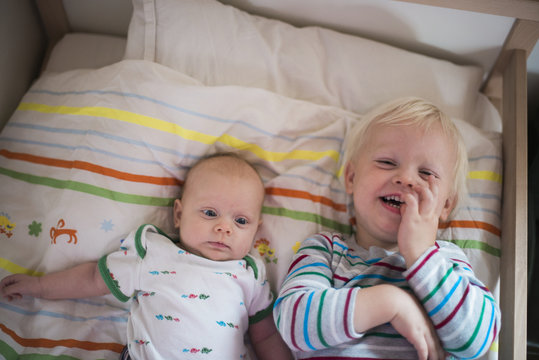 Kids in cot