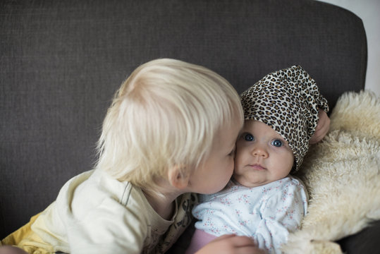 Brother with baby sister