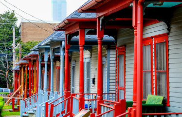 Fototapeta na wymiar A row of colorful wooden porches verandas