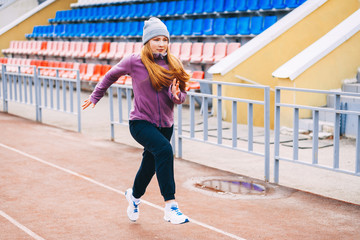 Obraz premium Young woman sportswoman.